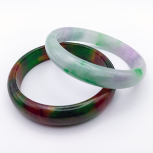 Image of bracelets showing the different colours of Jadeite